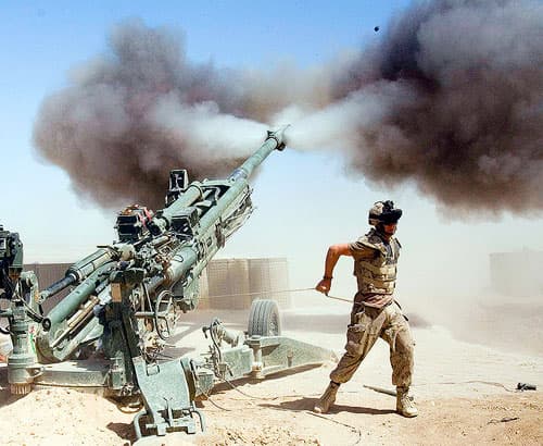 Gunner Jody Winsor, from Robert's Arm, Nfld., with the Canadian 2nd RCHA fires a 155mm howitzer in support of front line troops during a mission at the forward operating base in Helmand Province, Afghanistan