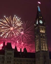 Fireworks display near parliament building.