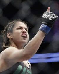 Cynthia Calvillo celebrates after defeating Amanda Cooper during a strawweight mixed martial arts bout at UFC 209