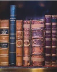 Old books on a bookshelf.