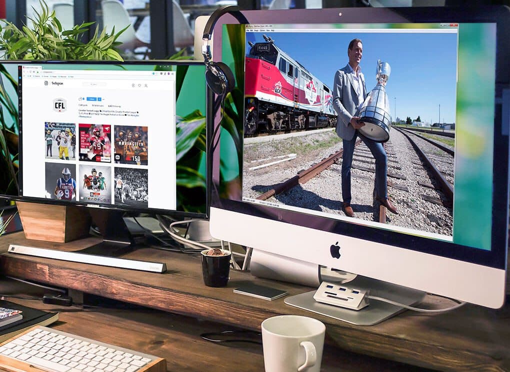 A CFL train tour photo and instagram page on two desktop monitors