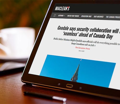 Article by The Canadian Press on Maclean’s website displayed on tablet screen.