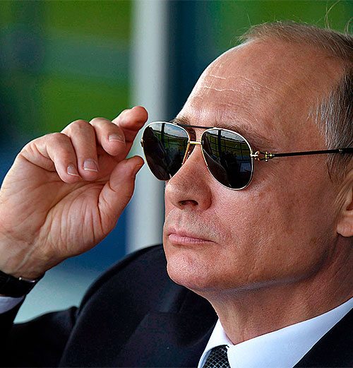 Vladimir Putin wearing dark sunglasses