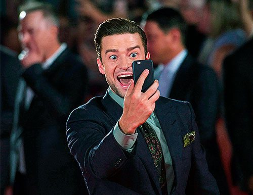 Justin Timberlake taking a selfie.