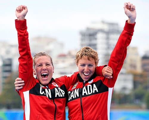 Canadian rowers Lindsay Jennerich and Patricia Obee, right, celebrate after winning a silver medal in the women's lightweight double sculls at the 2016 Summer Olympics in Rio de Janeiro
