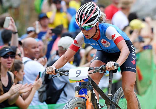 Canada's Emily Batty races to fourth in the women's cross-country mountain bike at the 2016 Olympic Summer Games in Rio de Janeiro