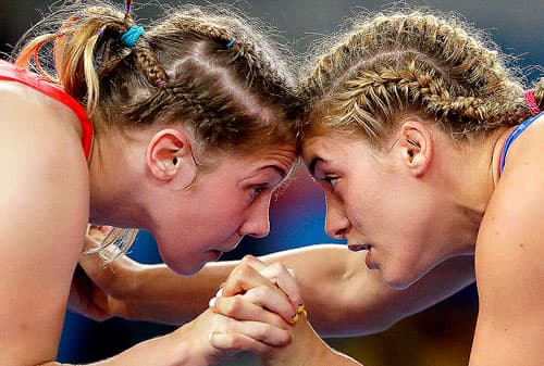 United States' Helen Louise Maroulis, right, and Ukraine's Yuliia Khavaldzhy Blahinya compete during the women's wrestling freestyle 53-kg competition at the 2016 Summer Olympics in Rio de Janeiro