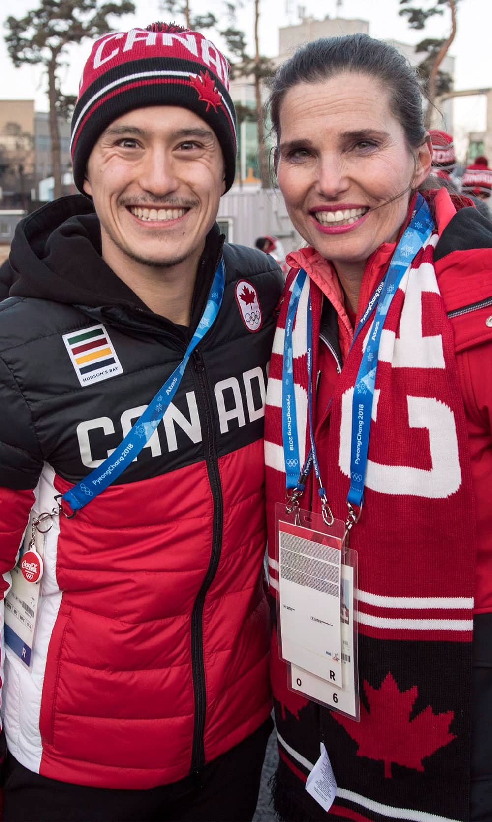 Figure skater Patrick Chan and Sport Minister Kirsty Duncan pose for a photograph