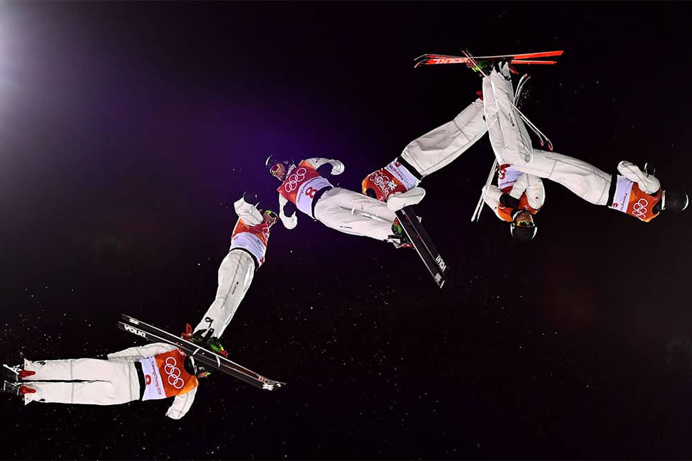 Canada's Olivier Rochon flies through the air during the men's freestyle ski aerials final