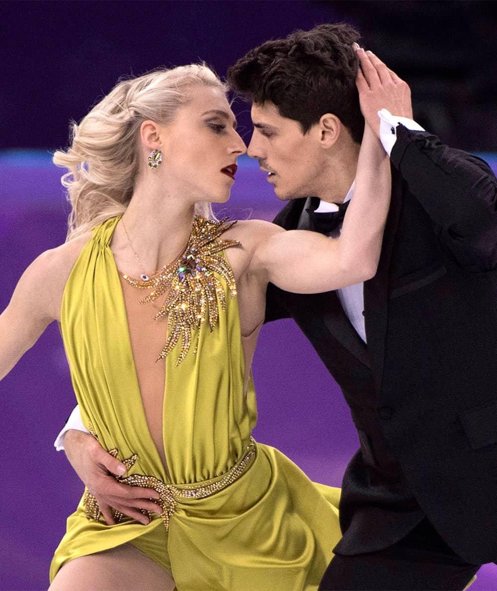 Canada's Piper Gilles and Paul Poirier perform in the ice dance figure skating free program