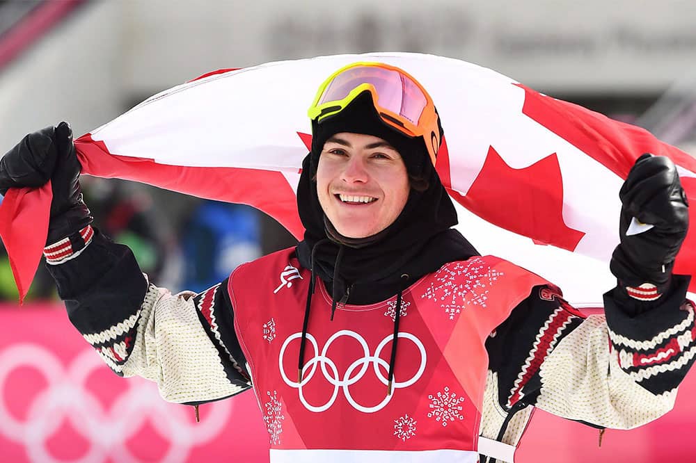 Gold medallist Sebastien Toutant of Canada celebrates following the men's snowboard big air final