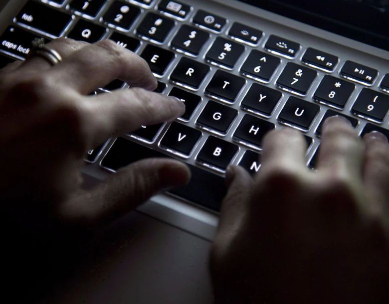 Hands type on a keyboard in North Vancouver, B.C., on Wednesday, December, 19, 2012. PHOTO BY JONATHAN HAYWARD /THE CANADIAN PRESS